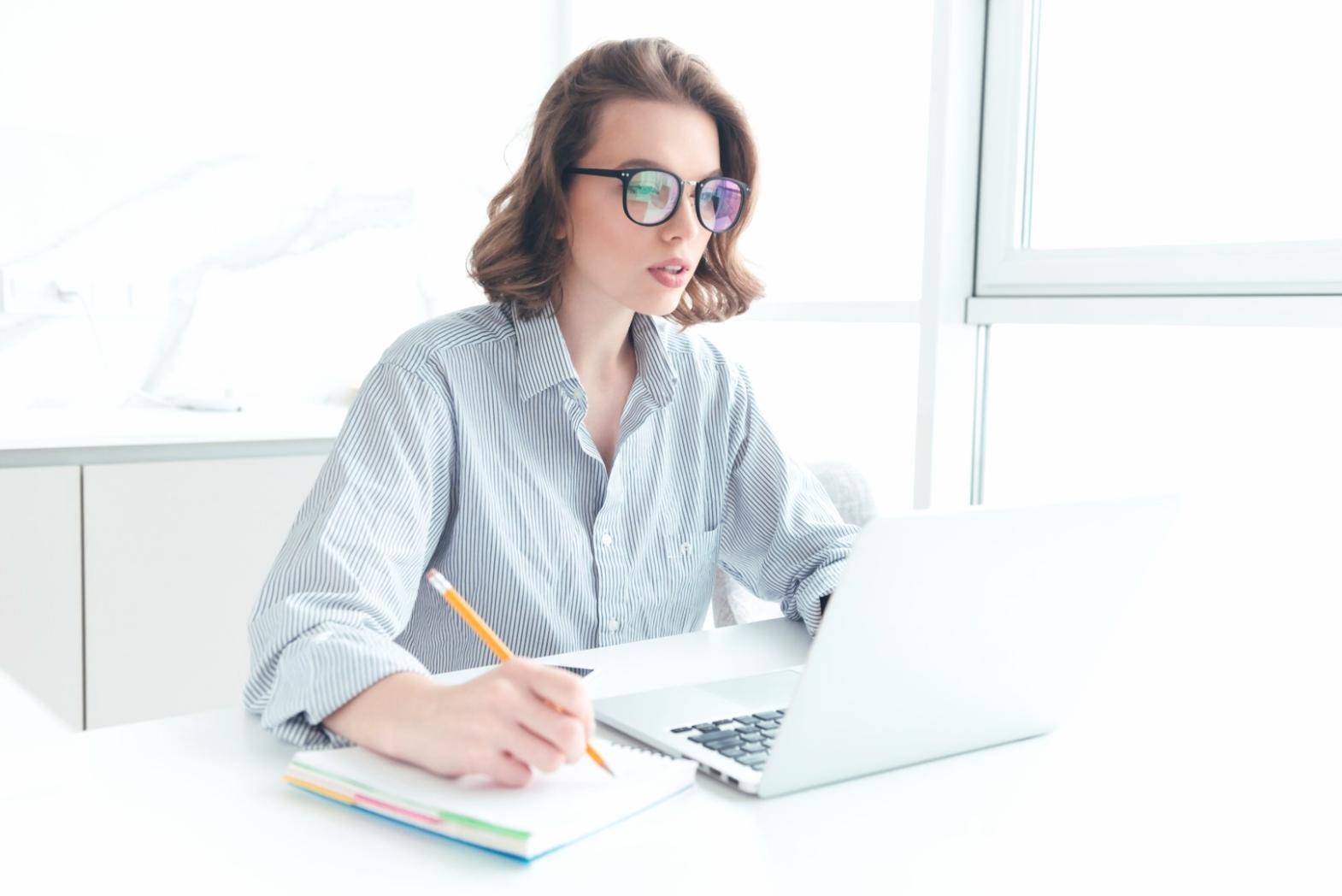 Financial analysis workspace showing business reports and strategic planning documents